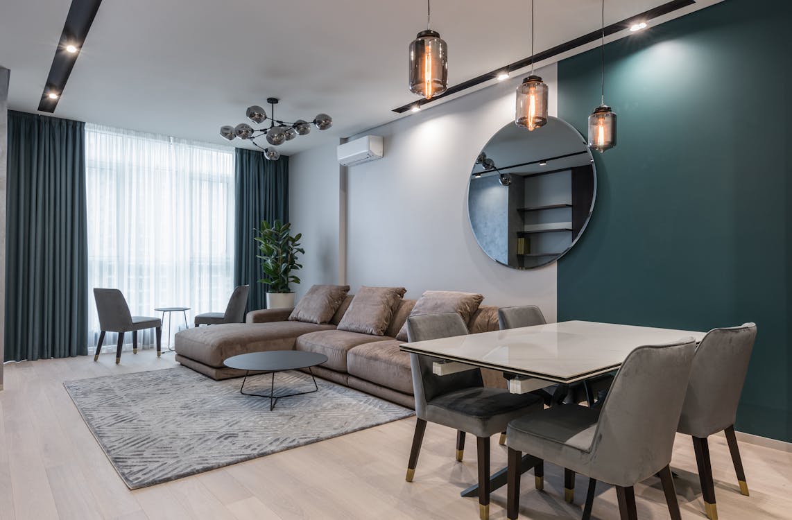 Sofá cama clic-clac tapizado en tela gris en Barcelona